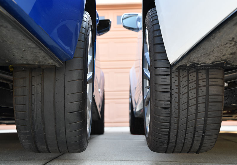 The Pilot Super Sport (left) and the Pilot Sport All-Season 3+. The two tires' similarities are noticeable. The PSS on the left, which is on our ATS-V manual Coupe, gets run pretty hard. The PS AS3+ on the right, is on our ATS-V automatic Sedan and doesn't get run quite as hard. Plus it gets driven more in the winter. Image: V-Net staff.