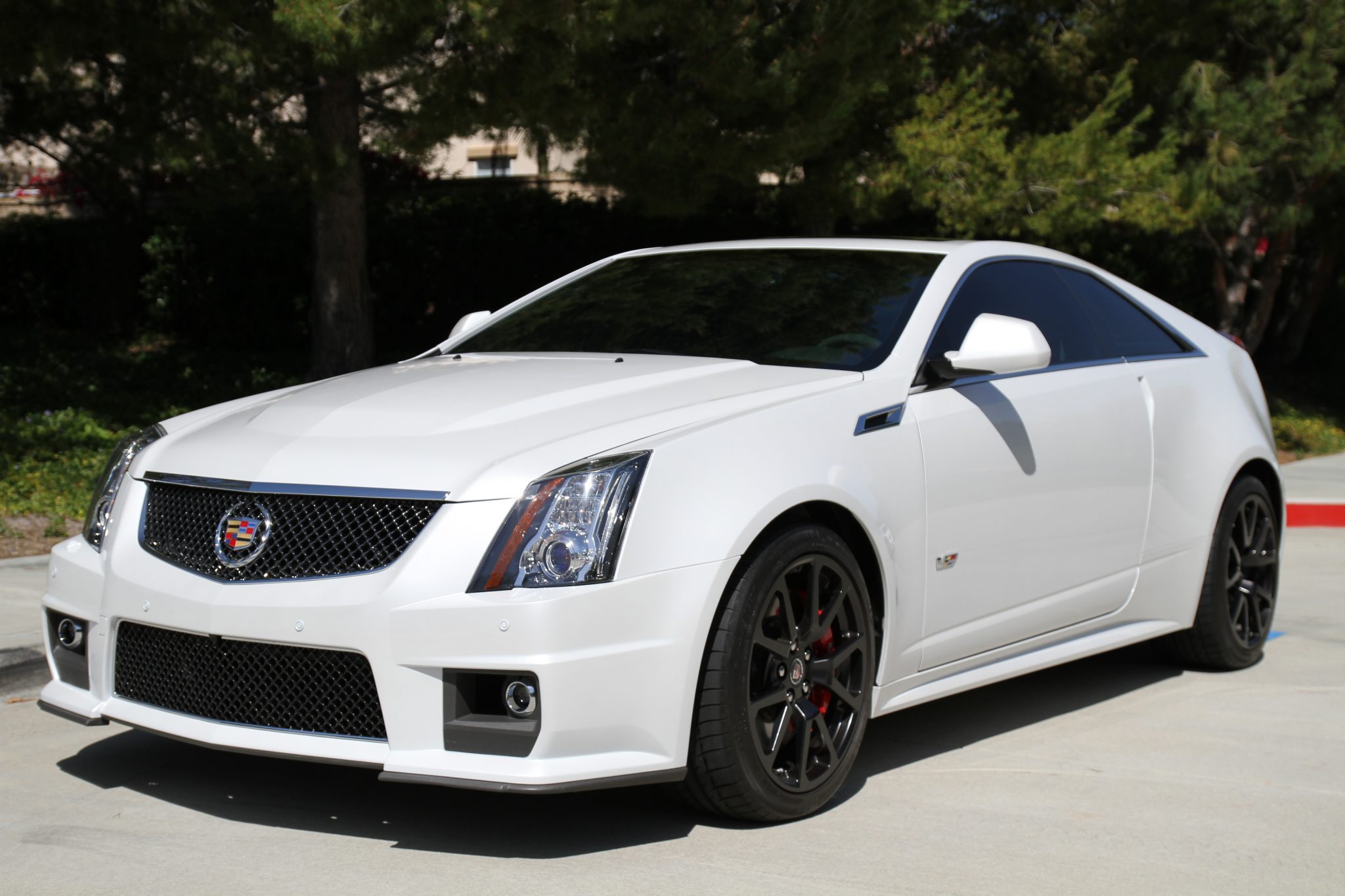 2011-cadillac-cts-v-coupe-crystal-white-tricoat-1.jpg