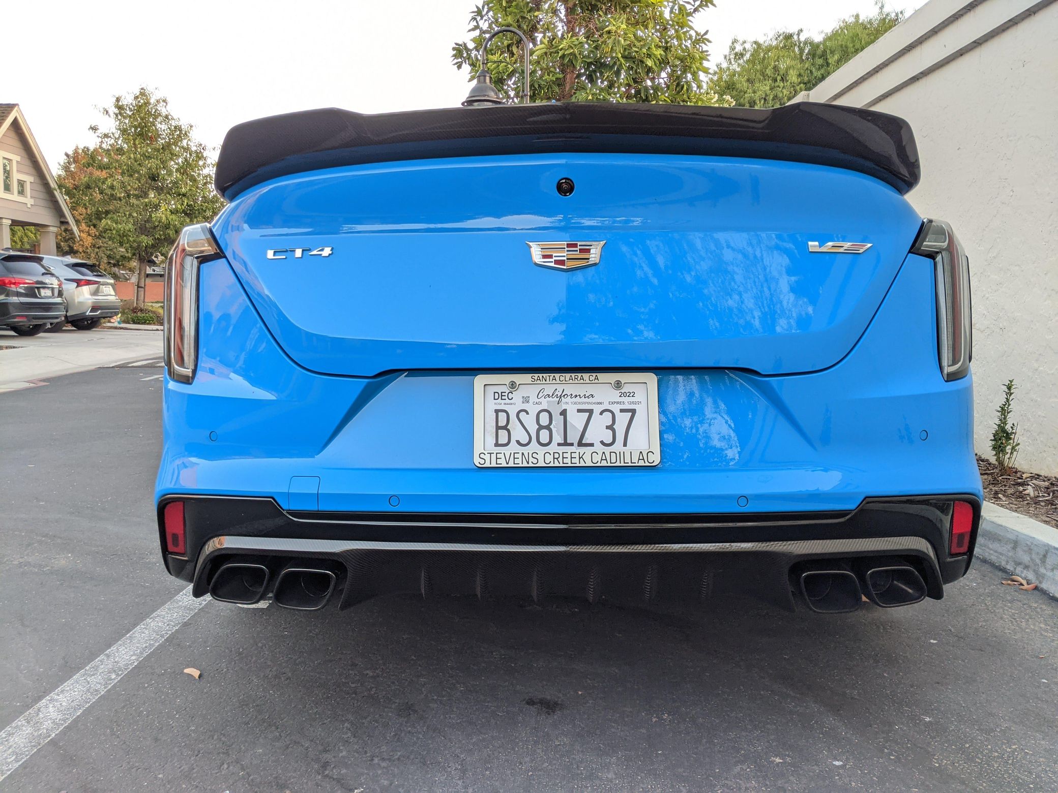 2022-Cadillac-CT4-V-Blackwing-GMA-Garage-Electric-Blue-Exterior-021-rear-high-angle.jpg