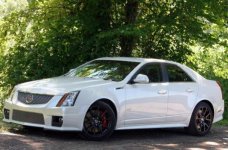 2013-cadillac-cts_v-sedan-exterior-left-610x403-c.jpg