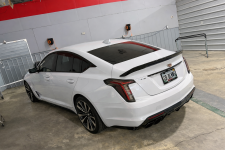 White Cadillac CT5-V in garage.png