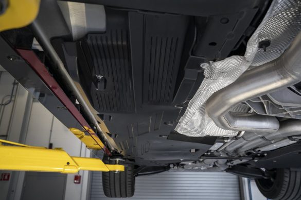 Body panels, including rear control arm covers, help to control airflow underneath the 2022 CT4-V Blackwing.