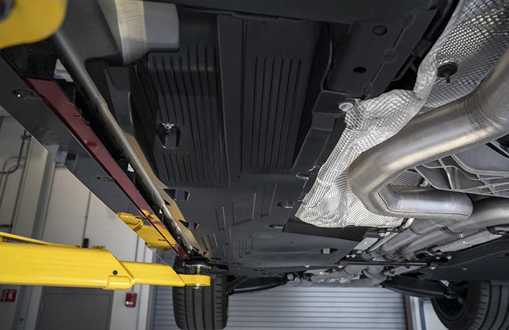 Body panels, including rear control arm covers, help to control airflow underneath the 2022 CT4-V Blackwing.